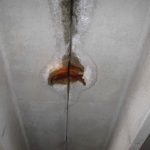 Failed joint sealant has led to water leakage and corrosion of embedded tee flange to tee flange connector which degrades the structural integrity of the parking structure.